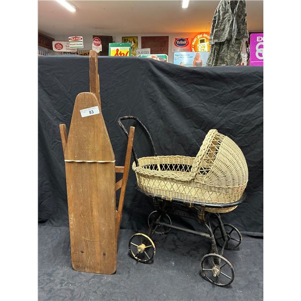Vintage ironing board and wicker doll stroller