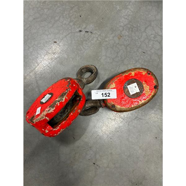 Pair of vintage pulleys