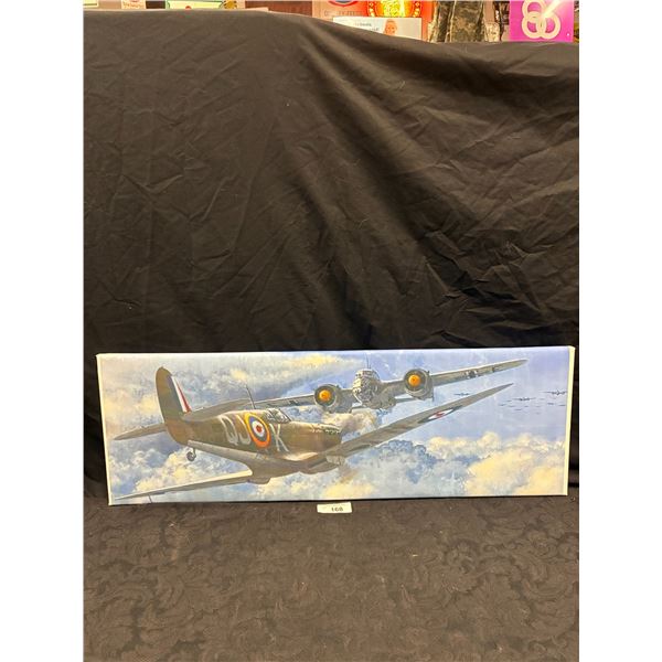 Large canvas print of Spitfire attacking Henckel Bomber 35"x12"