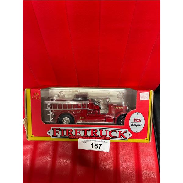 NIB vintage die cast fire truck made by ERTL 1:30 scale