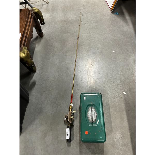 Vintage tackle box and fishing rod