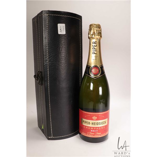 Piper-Heidsieck/ Brut Champagne/ 750ml/ 12% ABV Includes hinged leather like wrapped wine box Note: 