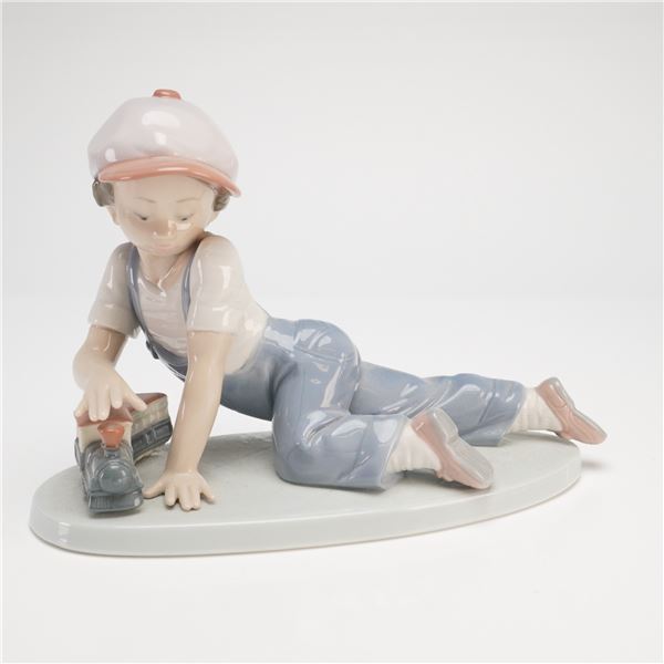 Lladro All Aboard Porcelain Figurine, Model #7619