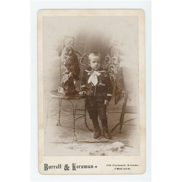 Boy with Taxidermy Owl Occupational Cabinet Photo