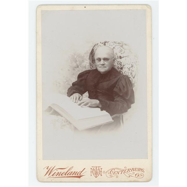 Blind Woman Reading Braille Cabinet Photo