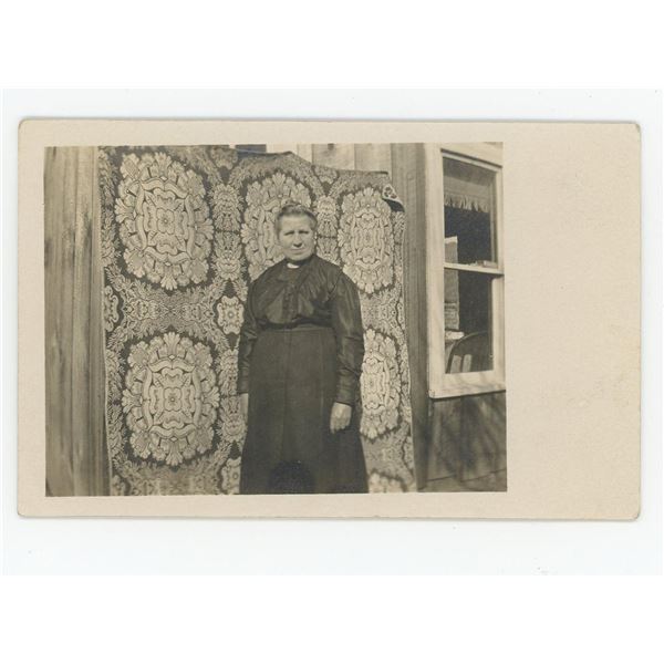 Mennonite Woman with Jacquard Coverlet Postcard