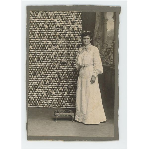 Woman with Tumbling Block Pattern Quilt Photo