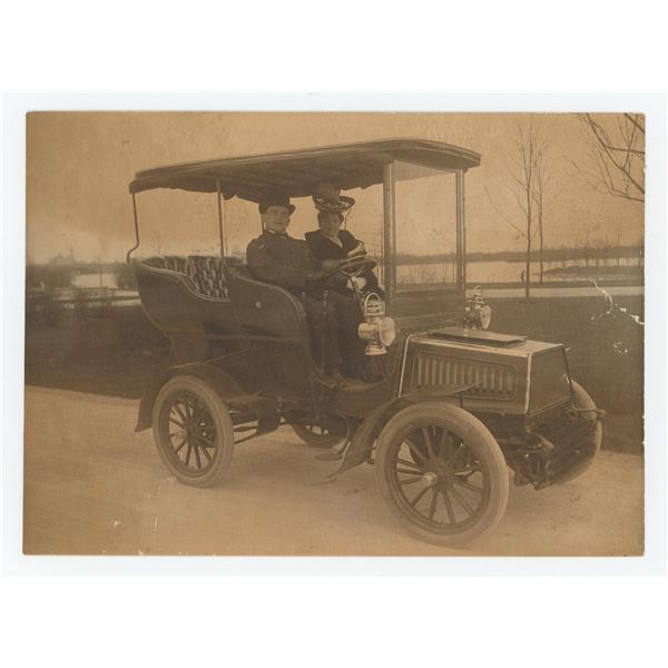 Couple Driving Model T Touring Car Photo