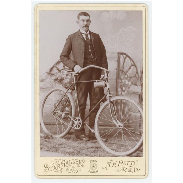 Iowa Man with Safety Bicycle Cabinet Photo