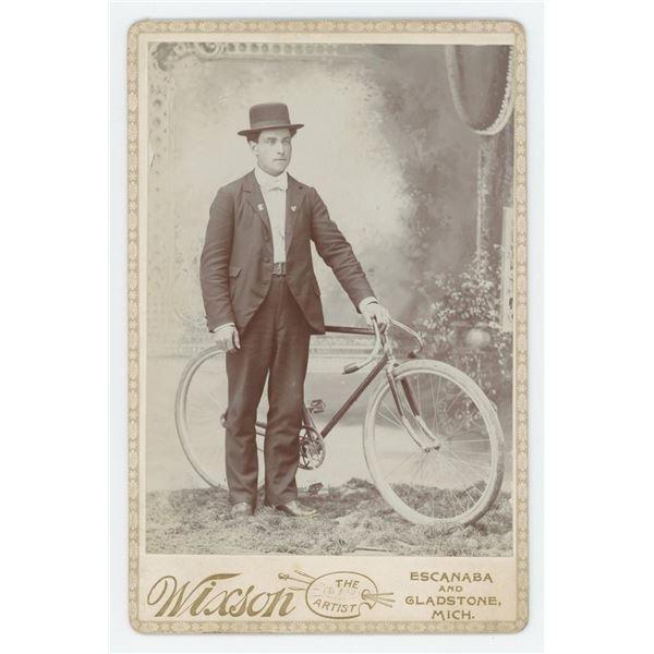 Michigan Man with Bicycle Cabinet Photo