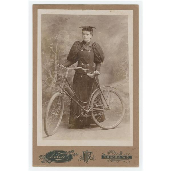 Wisconsin Lady with Bicycle Cabinet Photo