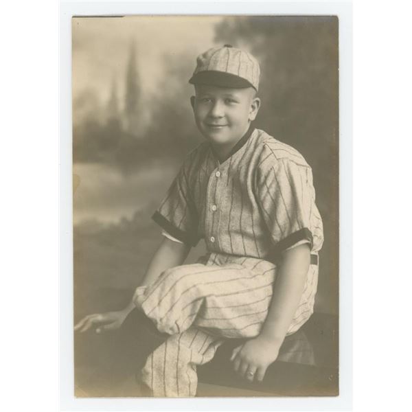 Boy in Pinstriped Baseball Uniform Photo