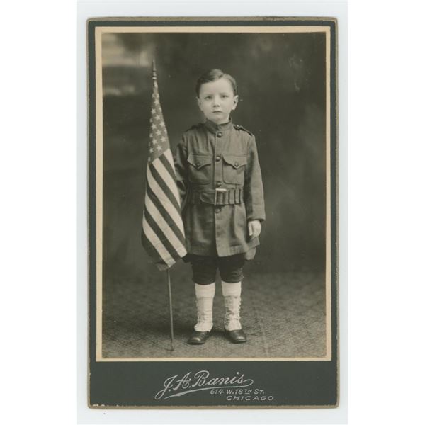 Patriotic Young Boy in Military Uniform Photo