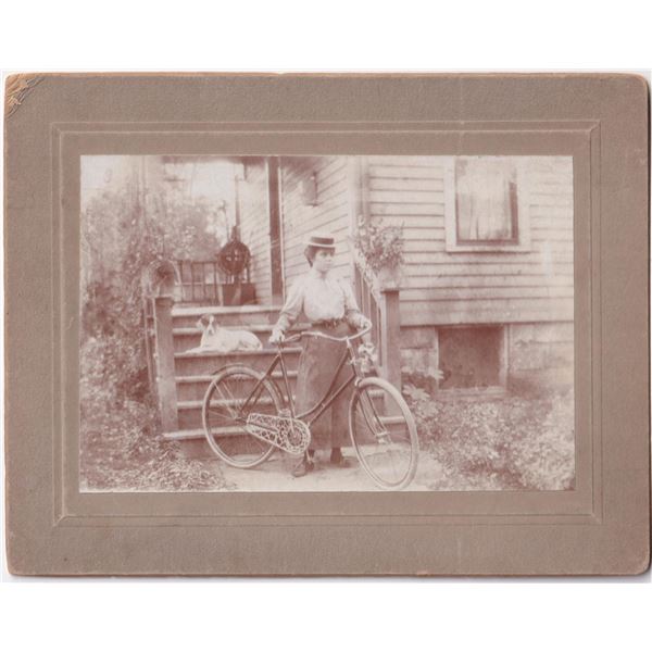 Woman with Dog and Bicycle Cabinet Photo