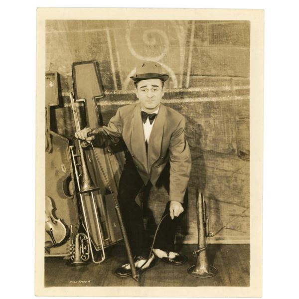 Wilbur Hall Playing a Tire Pump Photo