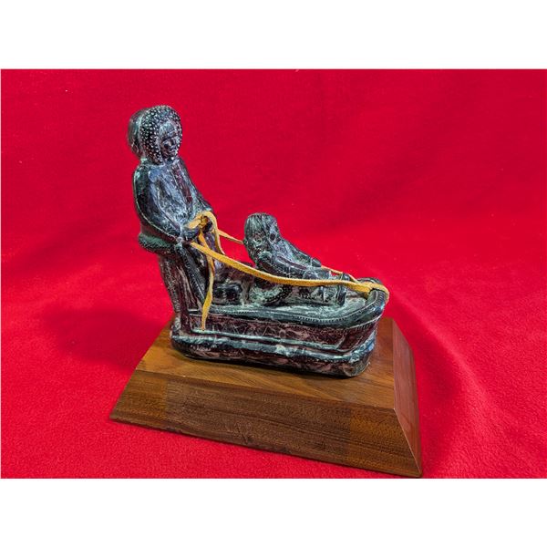 Intuit "Musher" Carving