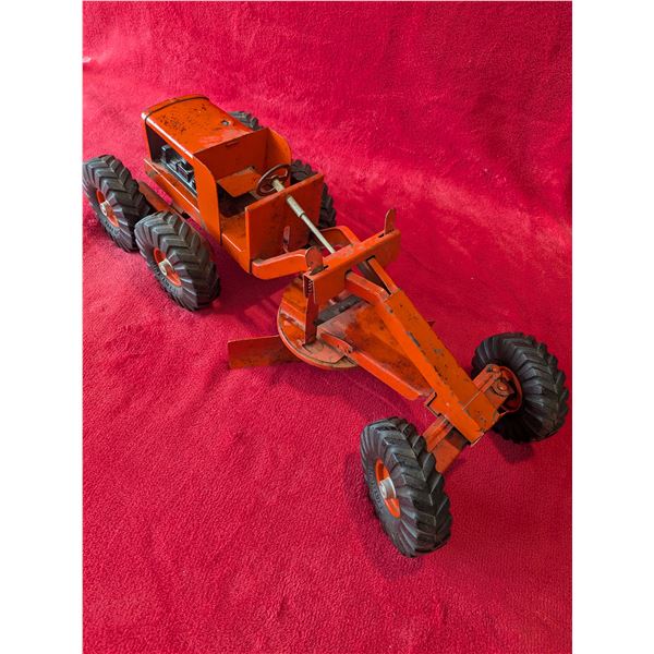 Vintage 1950s orange pressed-steel toy road grader by Nylint