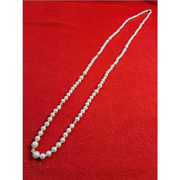 27" White beaded strand necklace