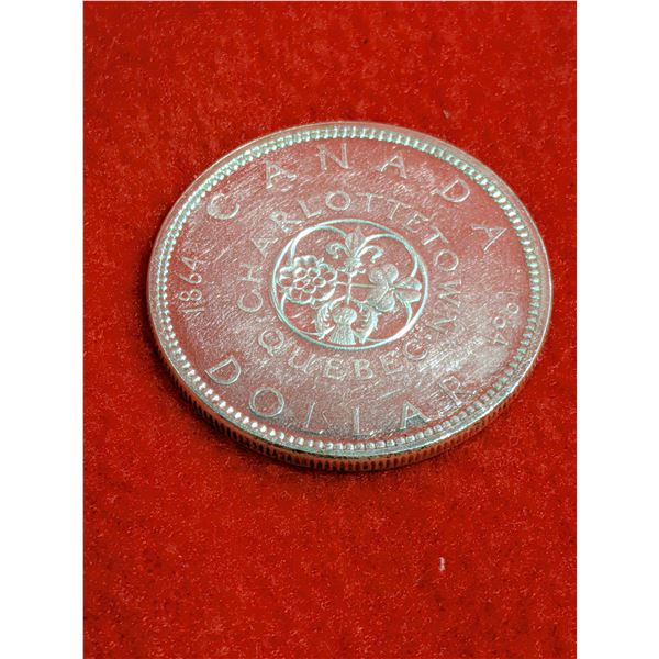 1964 Canadian Silver Dollar.