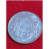 Image 1 : 1944 Canadian 50-cent silver coin.