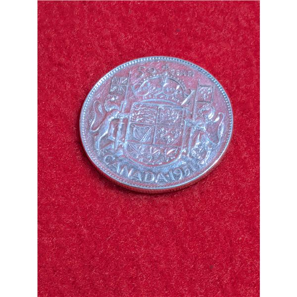 1951 Canadian 50-cent silver coin.