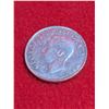 Image 2 : 1951 Canadian 50-cent silver coin.