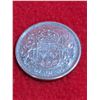 Image 1 : 1957 Canadian 50-cent silver coin.