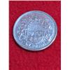 Image 1 : 1957 Canadian 50-cent silver coin.