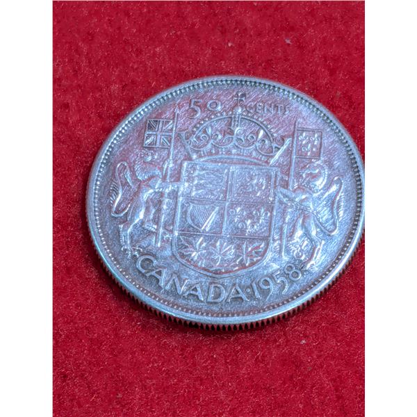 1957 Canadian 50-cent silver coin.