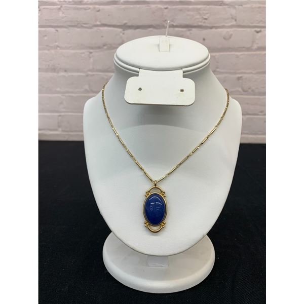 Monet Gold Tone Necklace with Deep Blue Gemstone Pendant