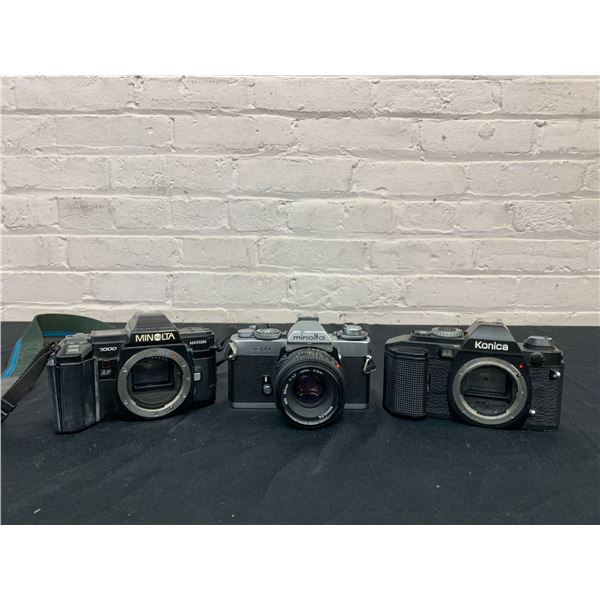 Lot of 3 Minolta and Konica Vintage Film Cameras Minolta 7000 Maxxum, XD11 Bodies, 1 w Lens