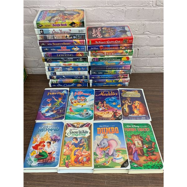 Lot of 31 Clamshell Disney, Warner Brothers VHS Movies