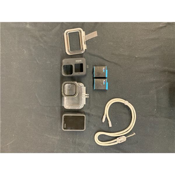 GoPro with Batteries, Case, Strap