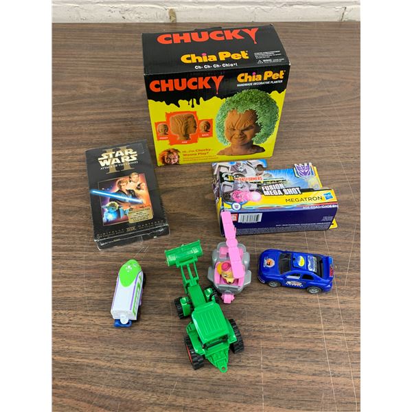 Assorted Vintage Toys, Chucky Chia Pet, Star Wars VHS Tape, Transformers Toy, etc