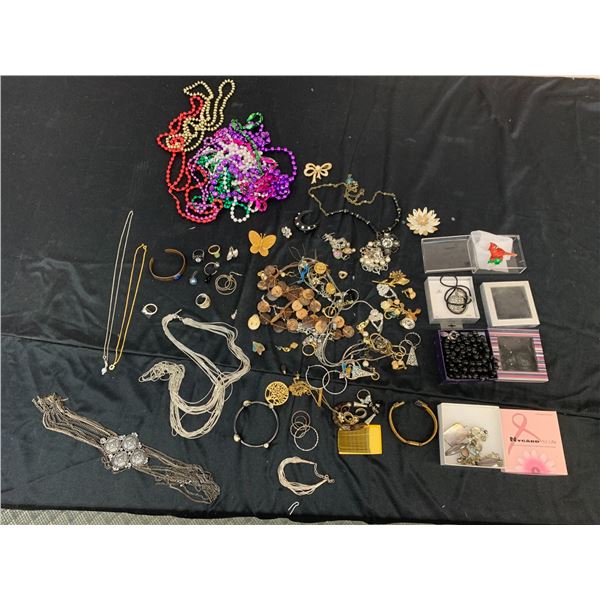 Table of Unsorted Costume Jewellery (some brand names) Brooches, Necklaces, Earrings, Bracelets
