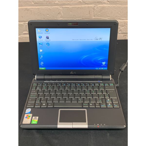 Asus Eee PC *powers on works* Laptop with Windows XP 10" Screen
