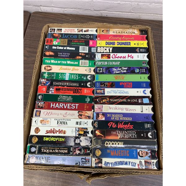 Lot of Approx 72 VHS Tape Movies Assorted Rocky, Dumb & Dumber, Reservoir Dogs, etc