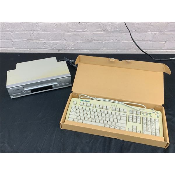 Vintage Sylvania VHS VCR and e Machines Keyboard