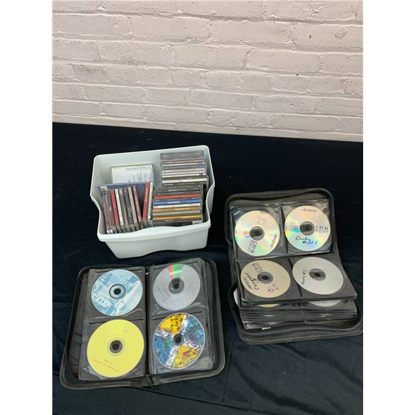Bin of Assorted CDs and CD Cases