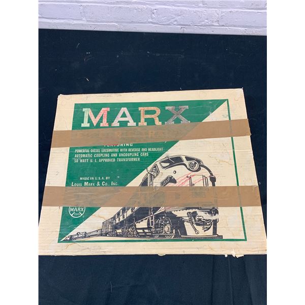 Box of Marx Trains Cars and Engine HO Scale
