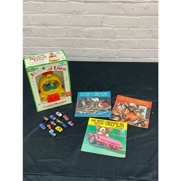 Lot of Vintage Gremlins Record Storybooks, Cookie Monster Musical Loco, Micromachines