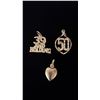 Image 1 : THREE 10K CHARMS (2.9G)