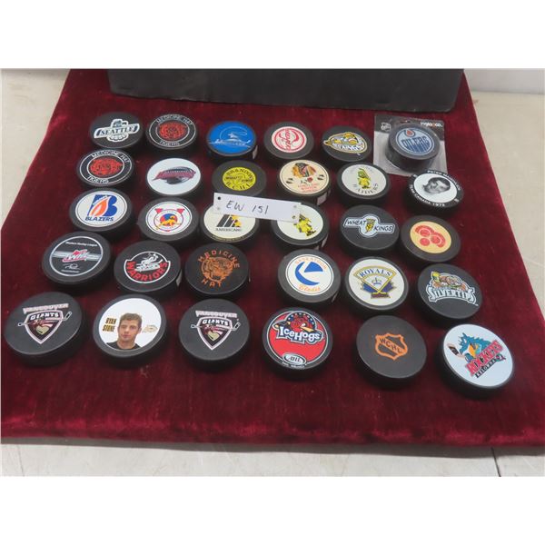 Hockey Pucks – WHL, WCHL, Peter Mahovlich and Oilers