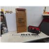 Image 1 : Garage Creeper with 'Osborne Auto Parts' Advertising, Milwaukee Bag, and Wall Mount Organizer Rack