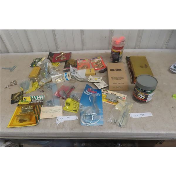 Assorted Hardware Including Door Hardware, Bungee Straps, and Window Hardware