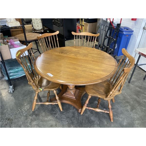 ROUND MAPLE TABLE AND 4 SPINDLE BACK CHAIRS