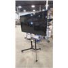 Image 1 : SAMSUNG 55" TV WITH WALL MOUNT ON PORTABLE TV STAND