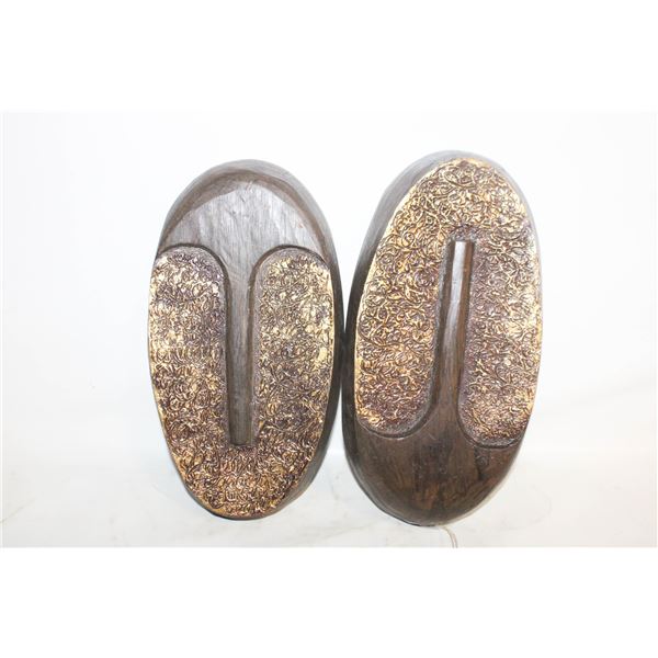 PAIR OF CARVED WOOD FACE PLAQUES