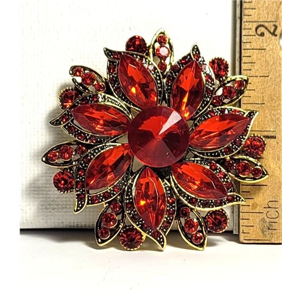 13) SHOWSTOPPER RED CRYSTAL GOLD TONE FLOWER