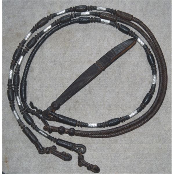 Silver mounted braided rommel reins